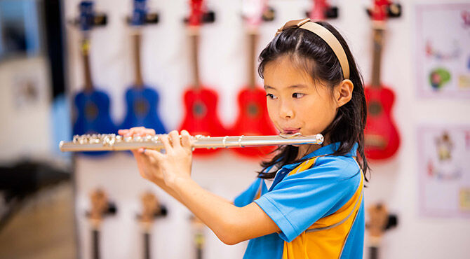 Dover Court International School student playing flute