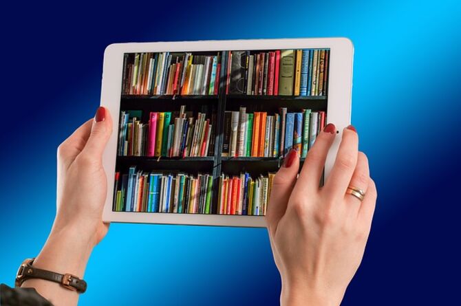 iPad with image of books on it