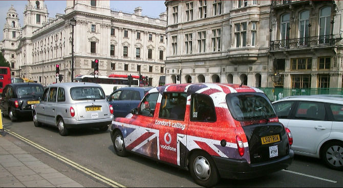UK Economy - image of taxi cab in Union Jack skin