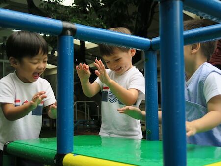 YCIS - children playing with water