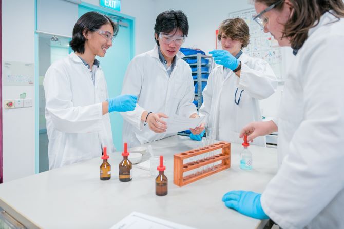 Image of XCL World Academy students in science lab
