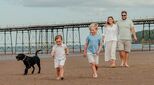 Family enjoying beach on Isle of Man