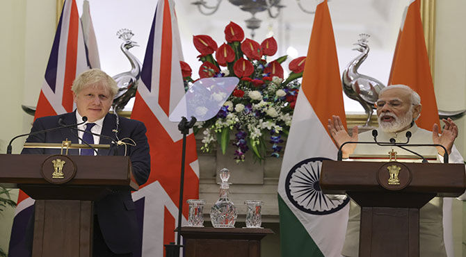 boris speaking at conference in india