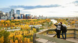 A couple overlooking the city of Calgary, Canada