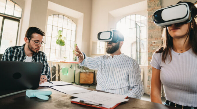 Team of people using VR headsets