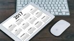 Image of calendar and a laptop