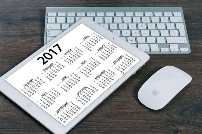 Image of calendar and a laptop