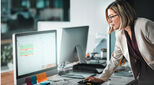 Shot of a businesswoman editing a sheet on her computer