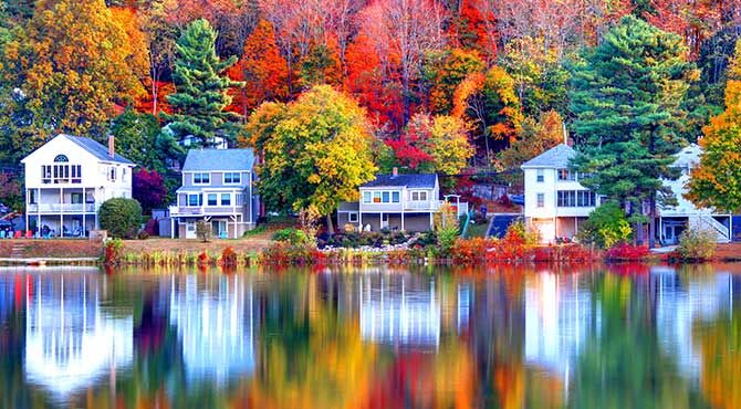 Homes outside of Boston USA in autumn after the leaves have begun to turn colour