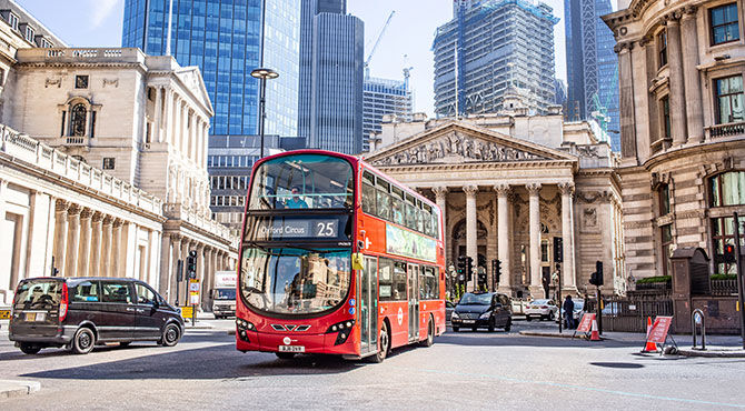 The Bank of England in the background with a London city bus