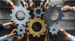 Team moving cogs together