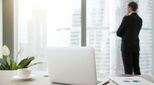 Businessman working in hotel room