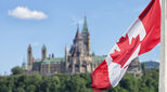 Canadian flag with building
