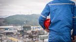 Image of construction worker surveying the scene