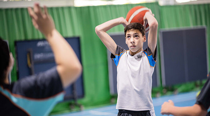 Dover Court International School boy playing basketball