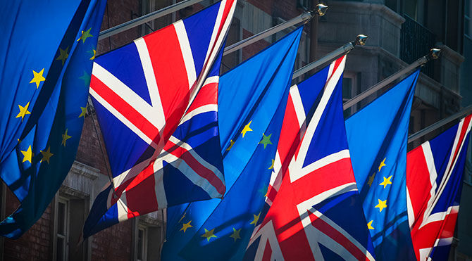 EU and UK flags flying