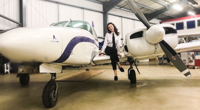 Trainee pilot Carrie Clark is trying to make the aviation industry more accessible to young people.