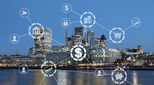Fintech symbols superimposed over the London skyline
