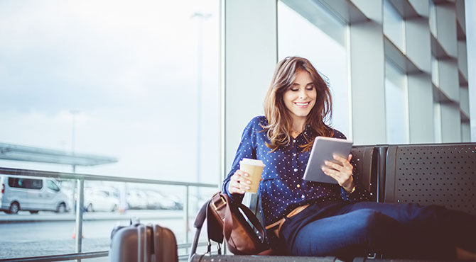 Business travel: Reading in airport