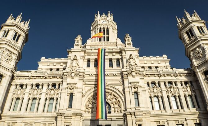 Madrid gay pride rainbow banner on building