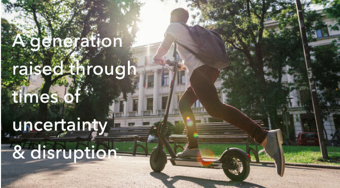 Side view image of young man riding electric scooter downtown