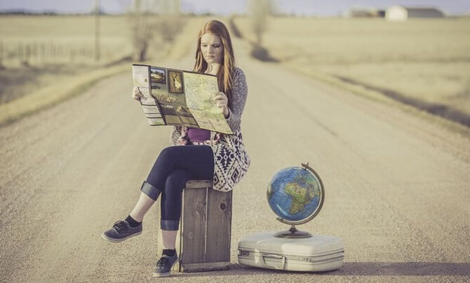 Picture of traveller looking at a map