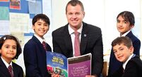 image of Brighton College Dubai headmaster and students