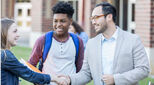 student group being welcomed by teacher