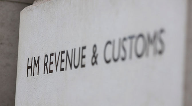 HMRC sign from offices at parliament square