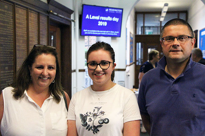 Holly Richards with her parents