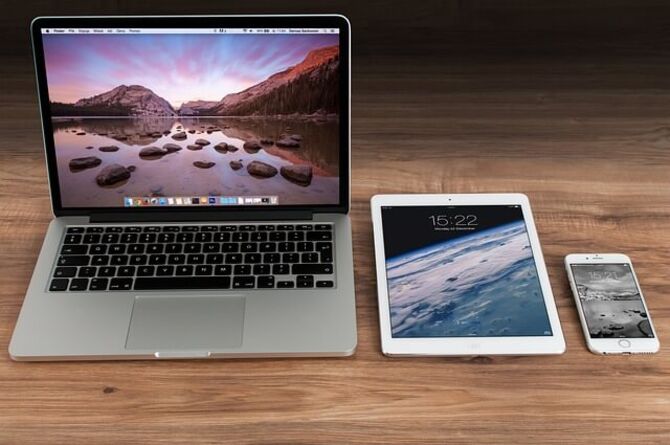 Image of Apple Mac laptop, iPad and iPhone