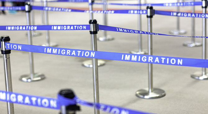 Empty immigration queue at an airport