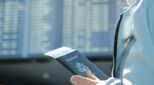 Hand holds a passport