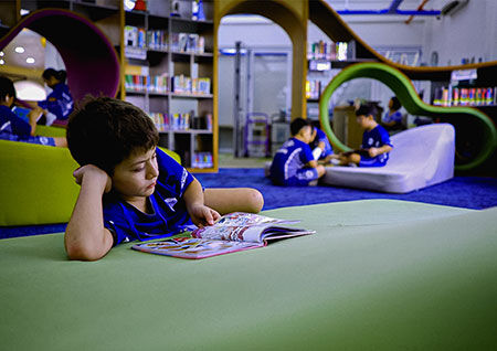 ISHCMC schoolboy reading