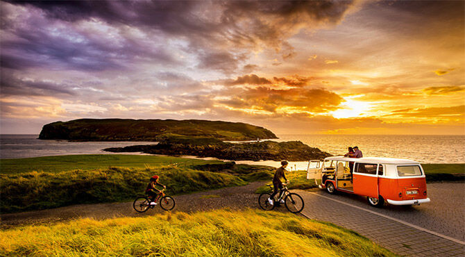 Landscape photo with camper van illustrating an article about quality of life on the Isle of Man