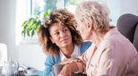 Employers are being urged to better support both staff living with dementia and those who have caring responsibilities.