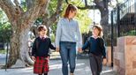 children-parent-walking-school