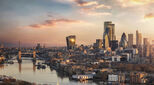The skyline of London city with Tower Bridge and financial district skyscrapers during sunrise, England, United Kingdom