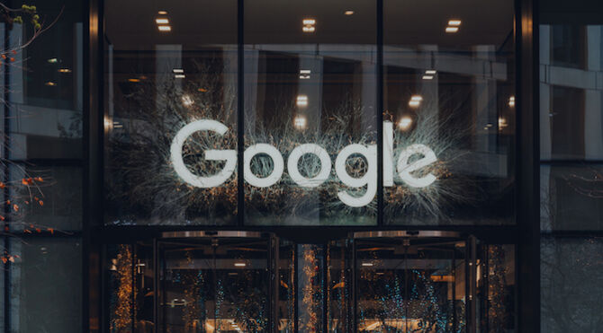 London, UK - January 01, 2022: Name sign above the entrance of Google offices in London. First Google office in the UK in opened in 2003 and has since grown to accommodate thousands of employees.