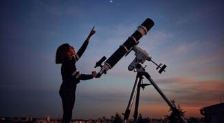 girl-telescope-stock-image