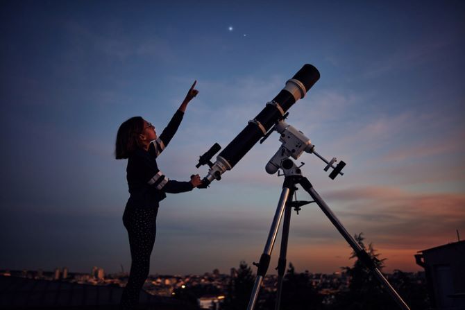 girl-telescope-stock-image