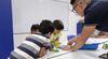 teacher-children-robotics-school-stock-image