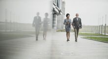 multi-generational-business-people-walking-stock-image