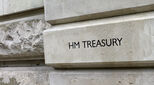 A sign on the stone wall of Her Majestys Treasury offices in Horse Guards Road, London. This government department is the ministry responsible for the economy and the nations finance: the Chancellor of the Exchequer is the most senior minister in the depa