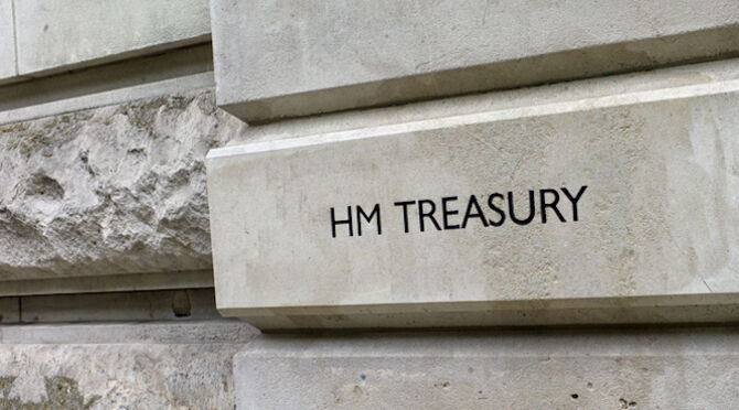 A sign on the stone wall of Her Majestys Treasury offices in Horse Guards Road, London. This government department is the ministry responsible for the economy and the nations finance: the Chancellor of the Exchequer is the most senior minister in the depa