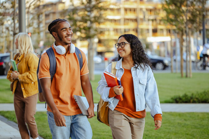 stock-image-university-students-walking-outside
