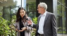 multi-generational-business-people-walking-stock-image