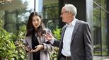 multi-generational-business-people-walking-stock-image