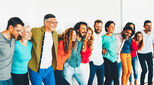 happy team of colleagues in a line