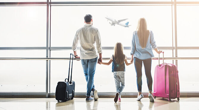 Relocating family at airport Chamness Worldwide